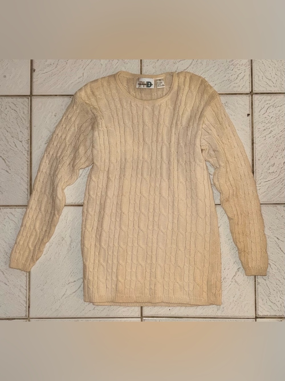 Vintage cream-colored cable-knit crewneck sweater